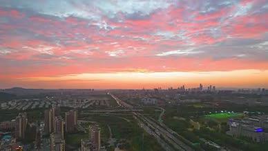 城市高速公路交通运输日落夕阳航拍延时视频的预览图